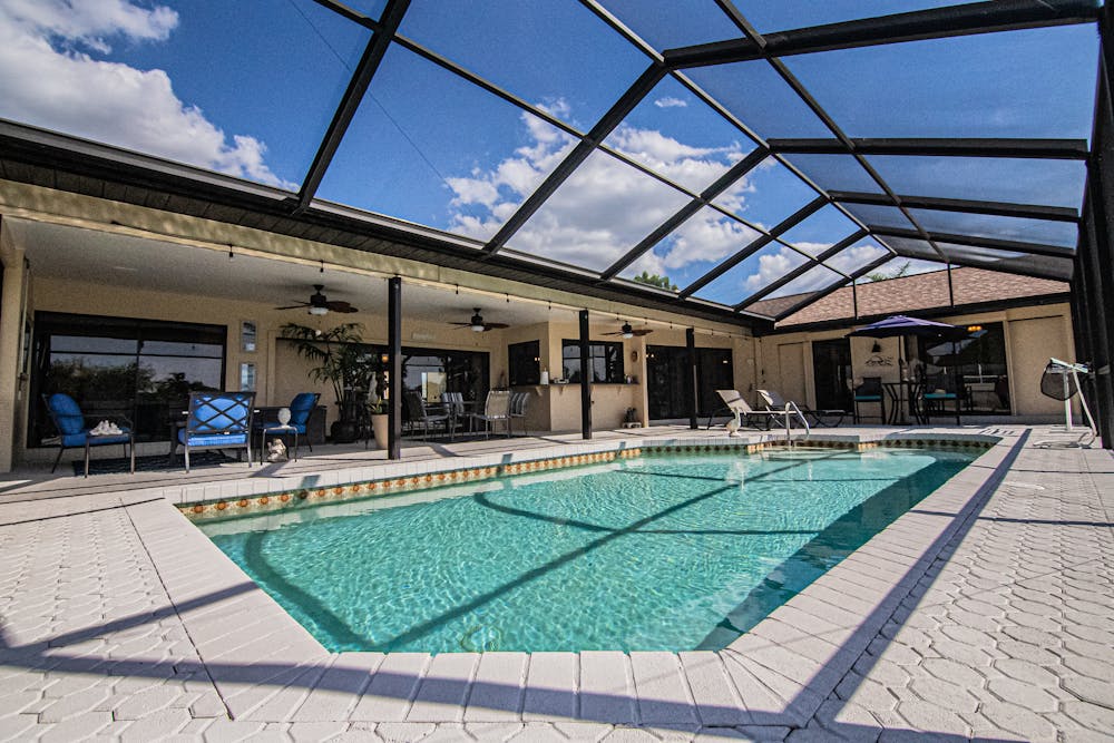 Luxury Pool Contractors in Romeo: Custom Backyard Living by Tango Pools
